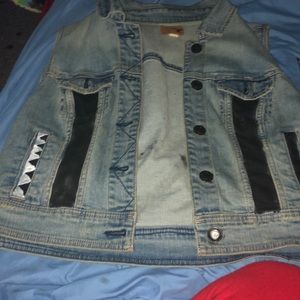custom designed sleeveless jean jacket